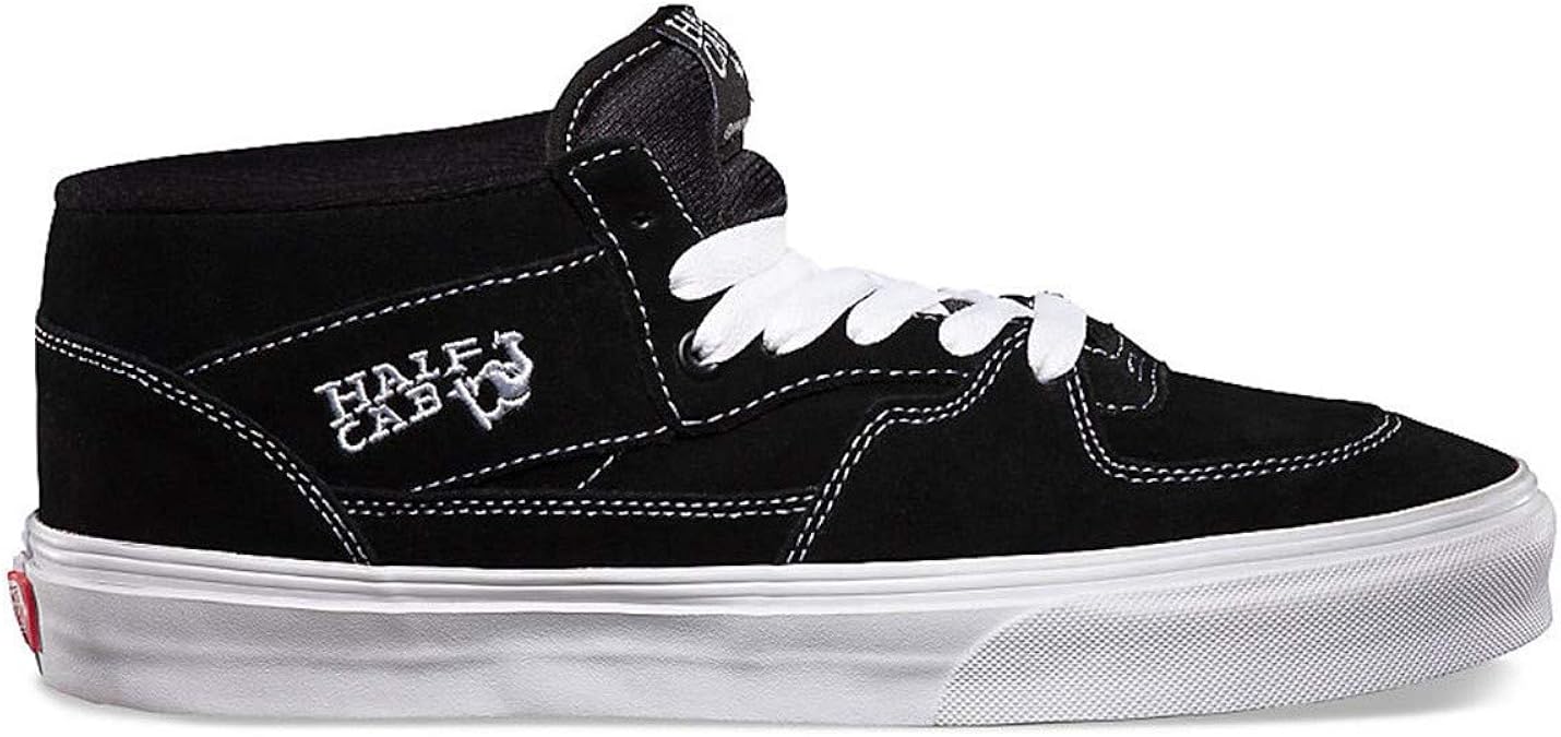 half white half black slip on vans