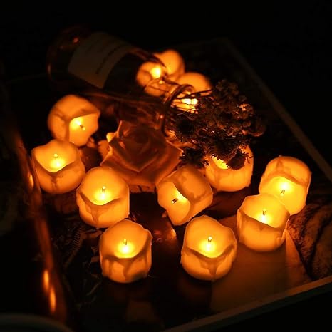 Amazon Com Led Tealights Candle Lights 12pcs Flameless Flickering Led Tea Light Candles Tear Wax Drop For Wedding Party Christmas Home Decor Yellow Home Improvement