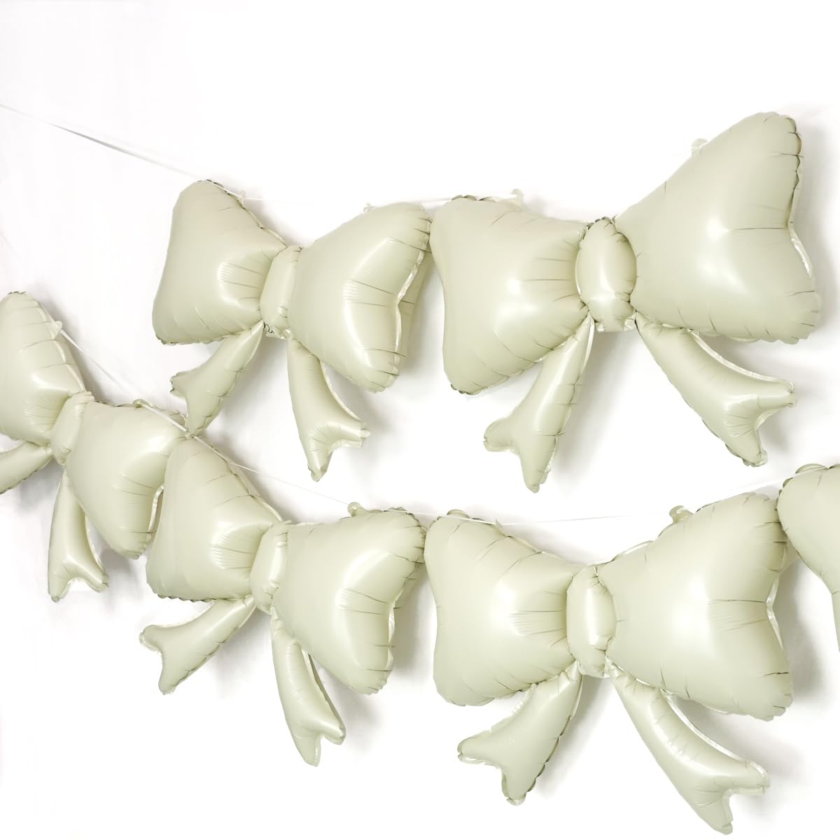Photo 1 of 6 Pieces Bow Balloons, Cream White Matte Metallic Foil Bowtie Balloon for Women Men Girls Boys Beige Bow Happy Birthday Party, Boho Groovy Party, Baby Shower, Balloon Garland Accessories