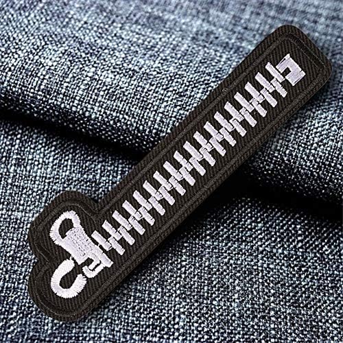 Colorful embroidered patches of various designs on a white background.