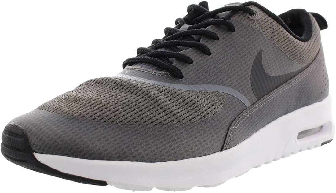 vans negras con blanco