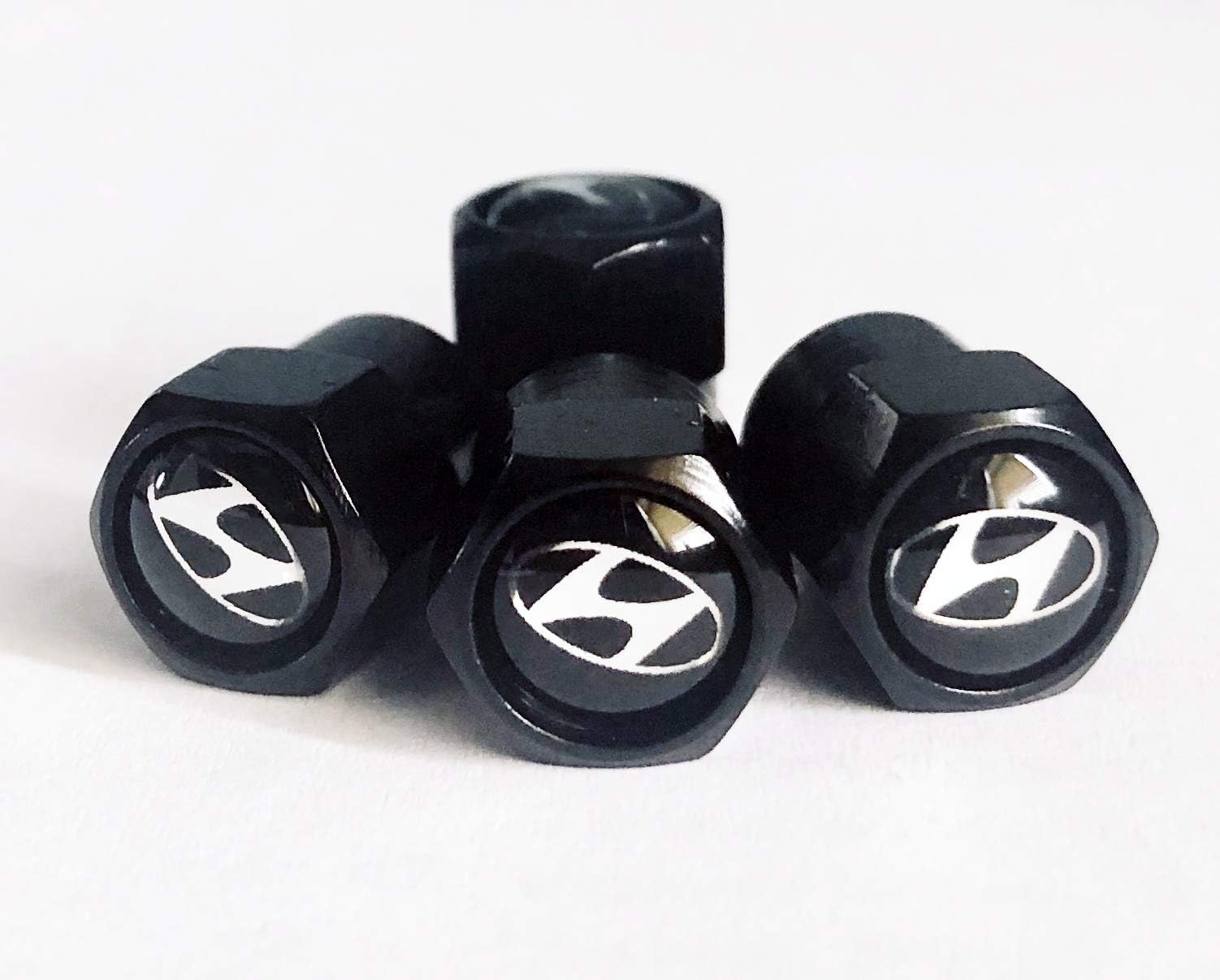 Black Valve Dust Caps - Set of 4. KONA IONIQ i800 Tucson Santa Fe IX35 I10 I20 I40 Accent Verna Aslan Elantra Avante Lantra Eon IX20 Grandeur Azera XG I10 Mistra Sonata Veloster Xcent Getz