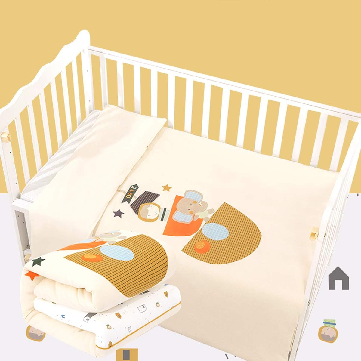cot bed quilt and pillow