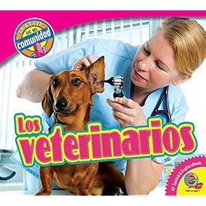Los veterinarios / Veterinarians (La Gente De Mi Comunidad / People in My Community) (Spanish Edition)