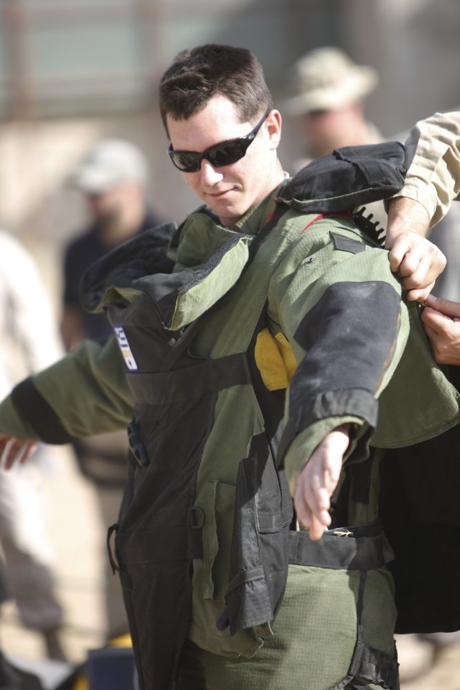 Posterazzi PSTTMO100374MLARGE Kunduz Afghanistan-A U.S. Marine gets German Army EOD Blast Suit Poste