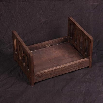 small wooden cot