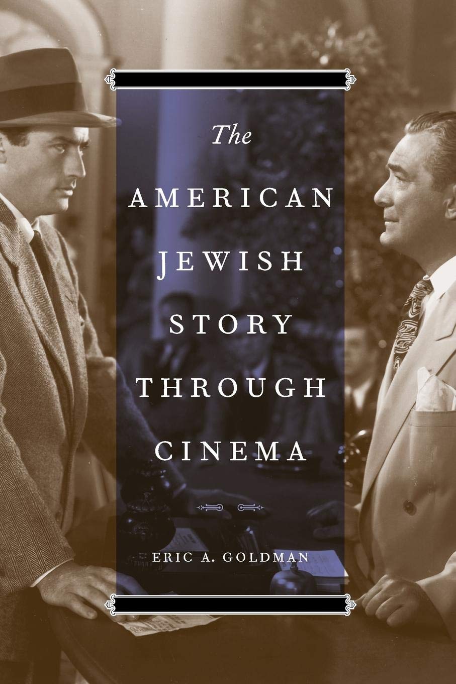 The cover of The American Jewish Story Through Cinema. The title is on a translucent blue rectangle with a black and white image of two men looking at each other in the background. 