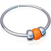 Silver nose piercing with a small 2mm bead