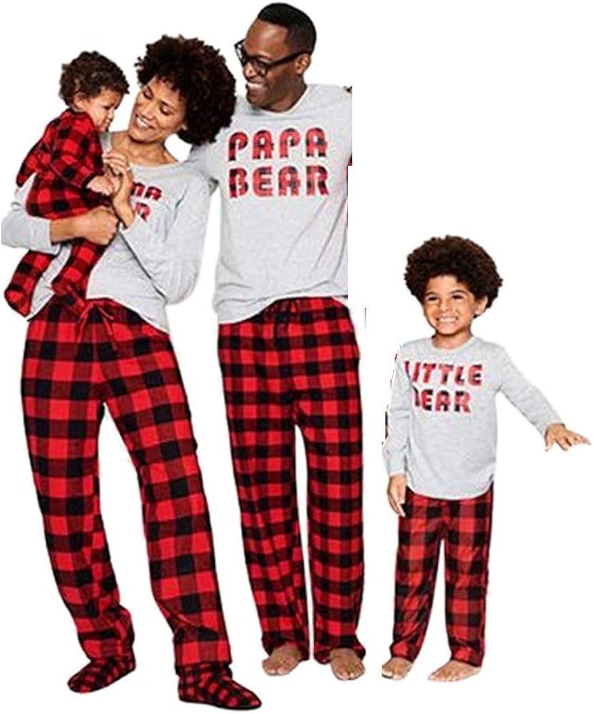 mom dad and baby matching christmas pajamas