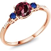 Gem Stone King 10K Rose Gold Red Rhodolite Garnet Blue Created Sapphire and White Diamond Accent 3-Stone Engagement Ring For Women (1.20 Cttw, Round 6MM, Gemstone January Birthstone)