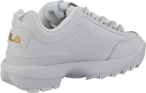 white and gold fila trainers