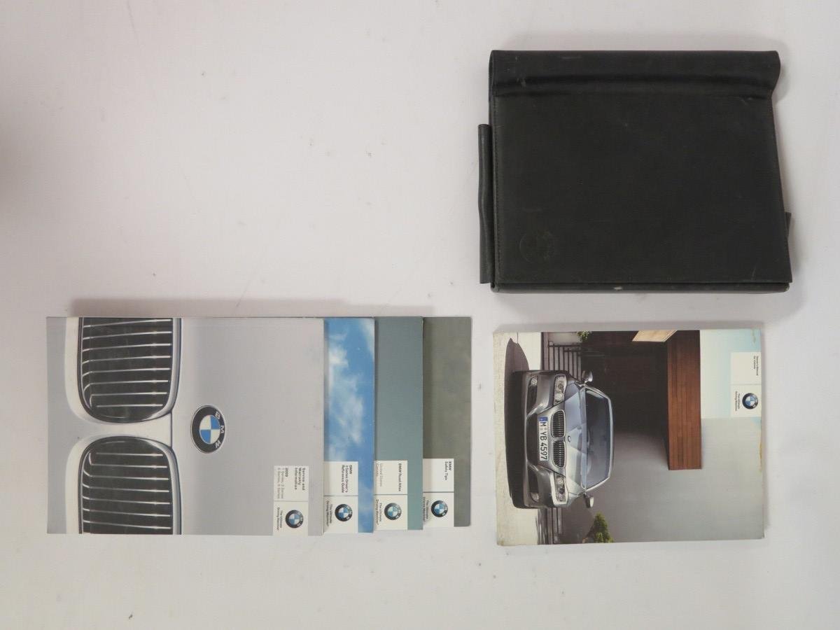 2009 BMW 3 SERIES SEDAN OWNER'S MANUAL Paperback – Box set, 2009
