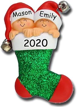 baby in christmas stocking