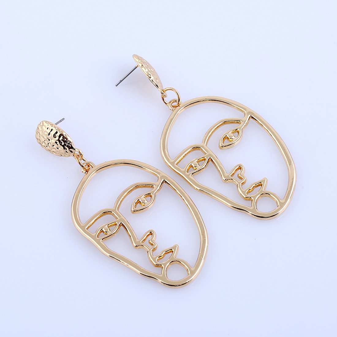 Resultado de imagen para aretes en forma de cara