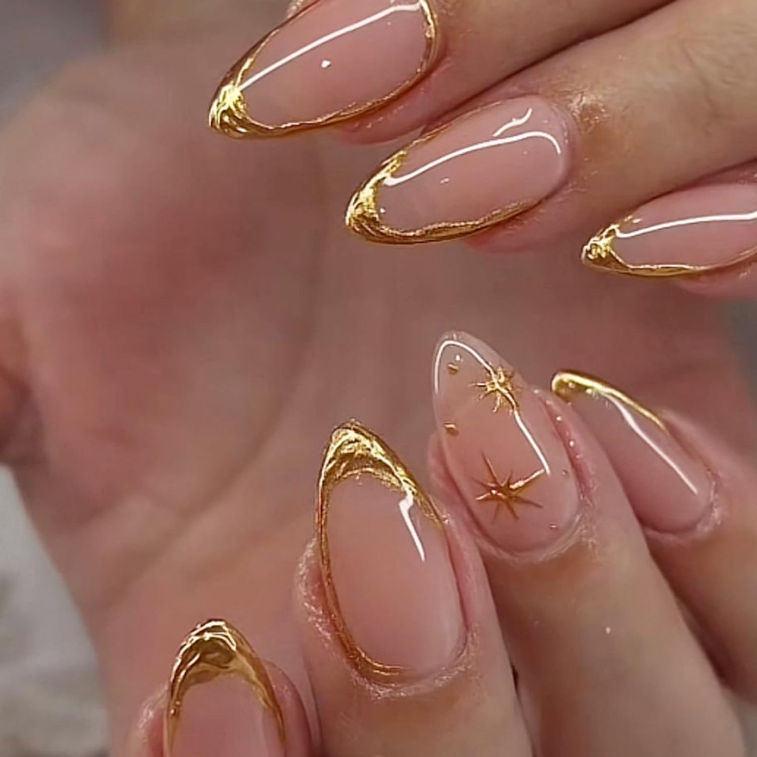 Photo 1 of 24Pcs Gold French Tip Press on Nails Almond Short Fake Nails Star Full Cover False Nails 3D Golden Stripe Glue on Nails Glossy Nude Acrylic Nails French Gold Artificial Nails Decoration for Women