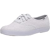 white eyelet tennis shoes