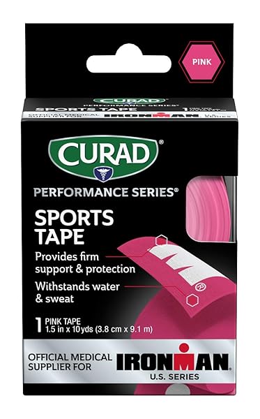 CURAD CURIM5024H PERFORMANCE SERIES IRONMAN SPORT TAPE, PINK WITH WHITE IRONMAN LOGO, 1.5″ X 10 YARDS SIZE