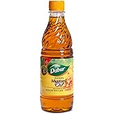 Dabur Mustard Oil, Cold Pressed for Hair, Skin &amp; Body Massage - 1000 ml | Cold-pressed mustard oil helps moisturize hair and skin while providing smooth glide during body and scalp massage routines.