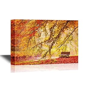 Bench Under a Bright Colored Autumn Tree