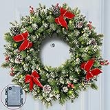 ANOTHERME Pre-lit 24 Inch Christmas Wreath 50 Clear LED Lights, with Timer, Pine Cones, Red Berries, Red Bows, Door Wreath with Snow Flocked