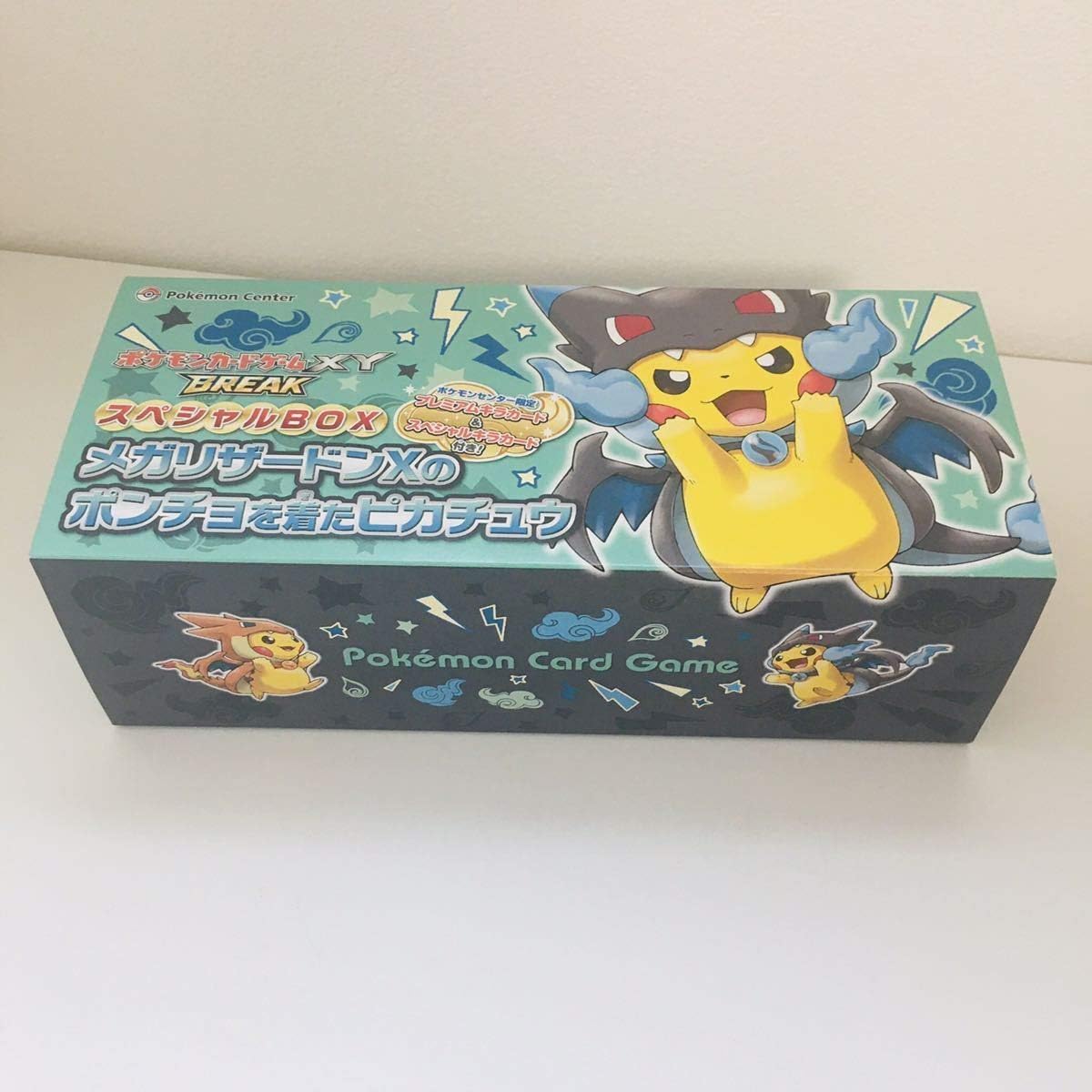 ポケモンカードゲームxy スペシャルbox メガリザードンxのポンチョを着たピカチュウ ストレージのみ おもちゃ ホビー Amazon