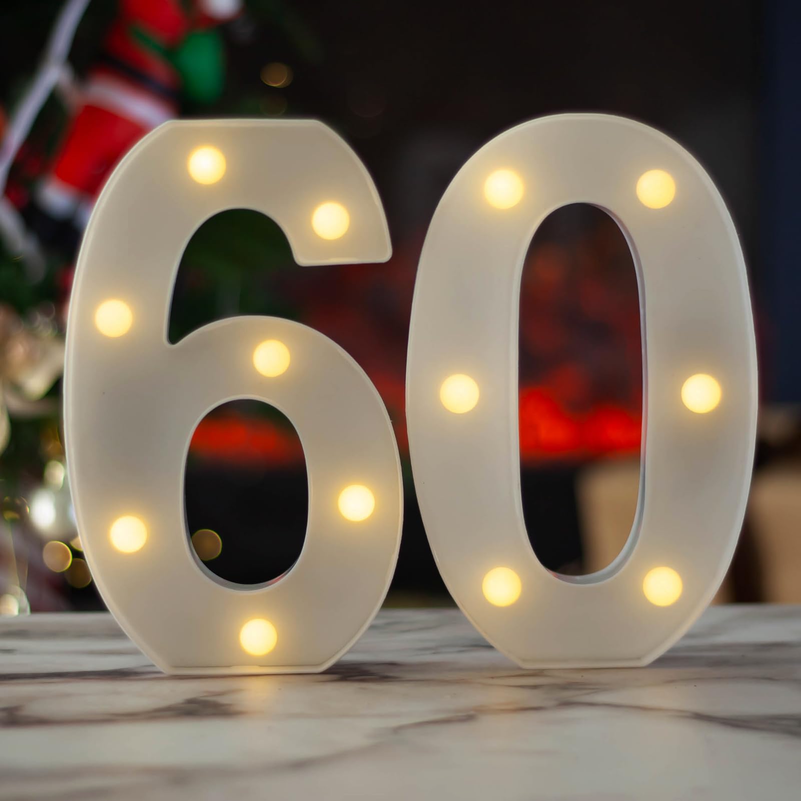 Photo 1 of SKYPHAROS LED Marquee Letter Lights, Decorative Light Up Numbers for 60th Birthday Party, Battery Operated, Warm White Small Marquee 60 Sign for Anniversary Decorations