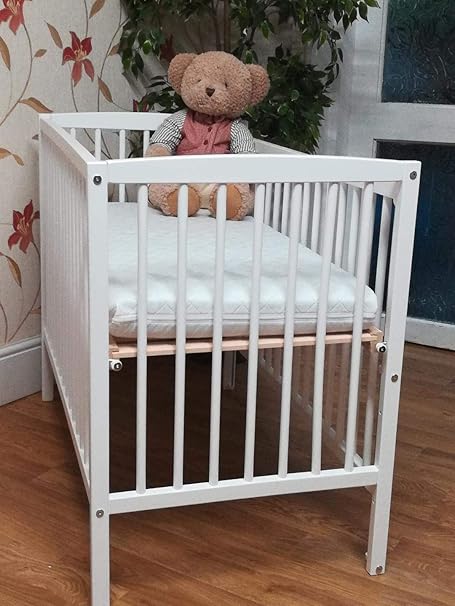 small white cot
