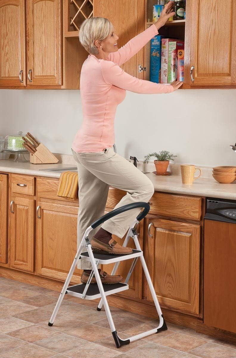 Delxo 2 Step Stool Folding Step Stool Steel Stepladders with Handgrip Anti-Slip Sturdy and Wide Pedal Steel Ladder Hold Up to 330lbs White and Black Combo 2-Feet - - 