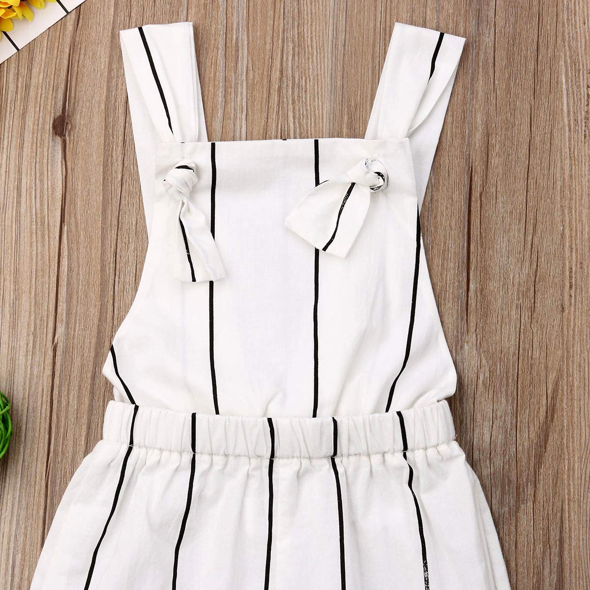white bell bottom overalls