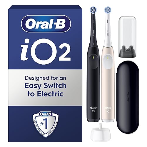 Oral-B iO2 Duo Electric Toothbrushes, 2 Gentle Care Toothbrush Heads, 1 Travel Case, 1 Travel Refill Holder, Oral B Toothbrush Adults (Night Black and Calm Pink), Designed by Braun, 2 Pin UK Plug