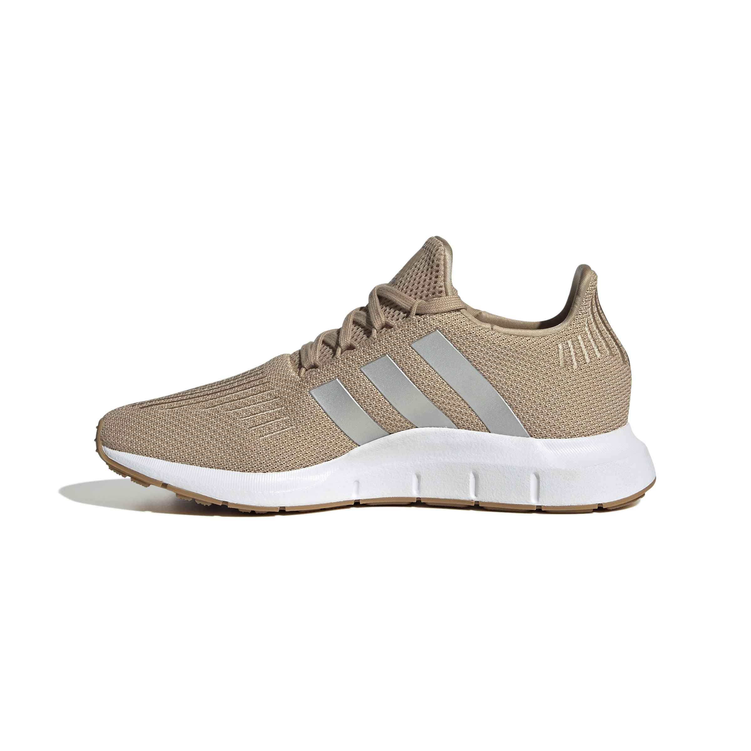 Photo 1 of ****FINAL SALE NOT RETURNS****
*****They are broken where the straps attach***
Adidas Women's Swift Run 1.0, Warm Sandstone/Silver Metallic/White, 8