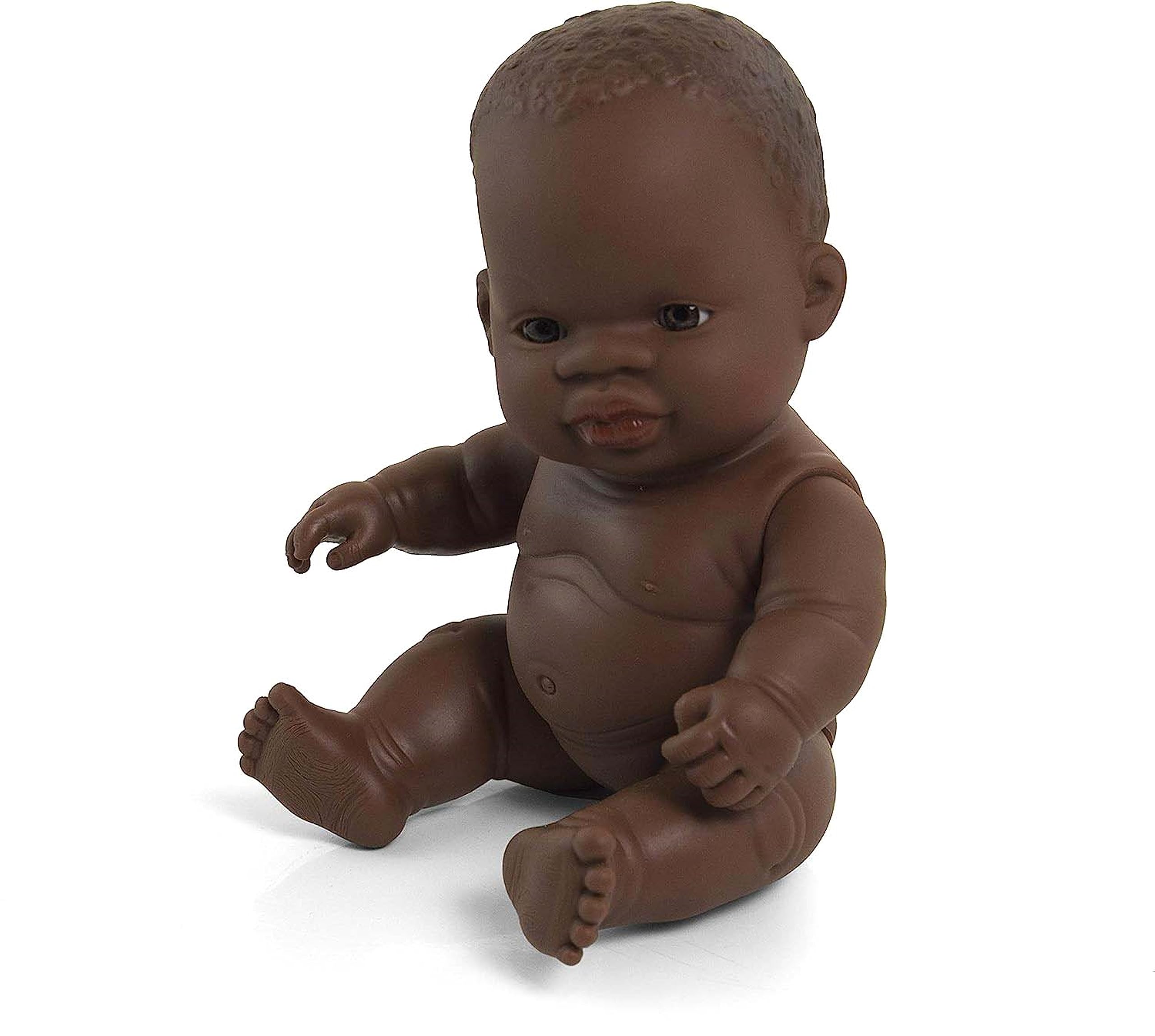 Miniland African girl doll without underwear in bag is soft vinyl, resilient and flexible. 21cm