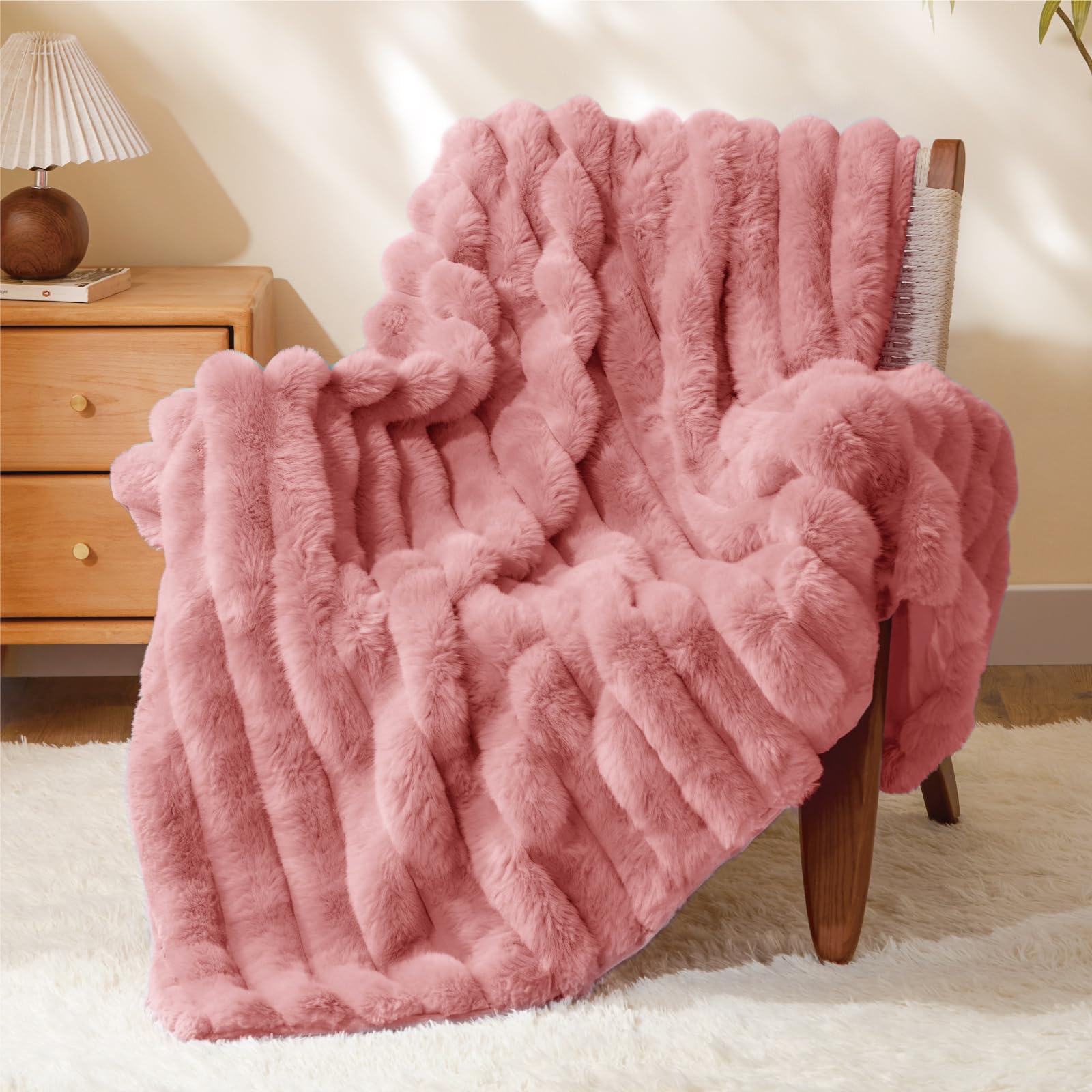 Photo 1 of BEDELITE Faux Fur Throw Blanket for Couch, Soft and Cozy Luxurious 3D Striped Fluffy Blanket, 770GSM Thick Warm Plush Fuzzy Faux Rabbit Fur Blanket for Women Gift (Pink, 60"x 80")