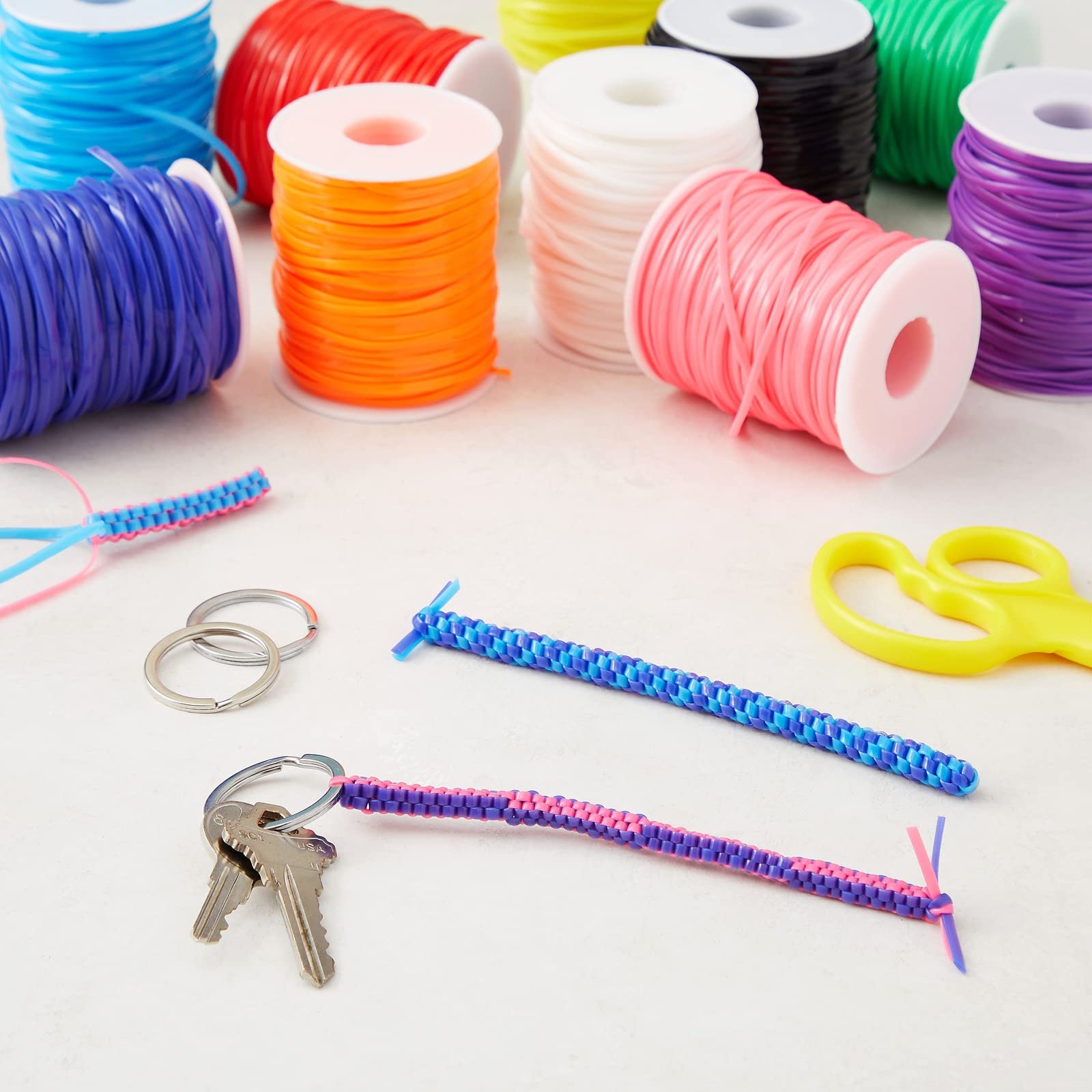 Juvale Lanyard String Kit - 10 Spools x 50 yd Rainbow - 2.5 mm x 1 mm Plastic Lacing Cord - Gimp & Boondoggle String for Bracelets, Keychains & Necklaces