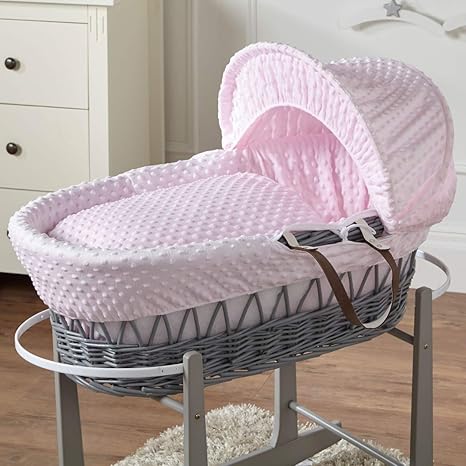 grey and pink wicker moses basket