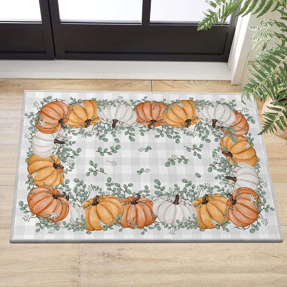 Photo 1 of Artoid Mode Orange Pumpkins Eucalyptus Leaves Fall Area Rug, Autumn Thanksgiving Bath Rug Home Decor Low-Profile Non-Slip Washable Rug for Entryway Bedroom Bathroom Laundry Room Indoor 2x3 Feet