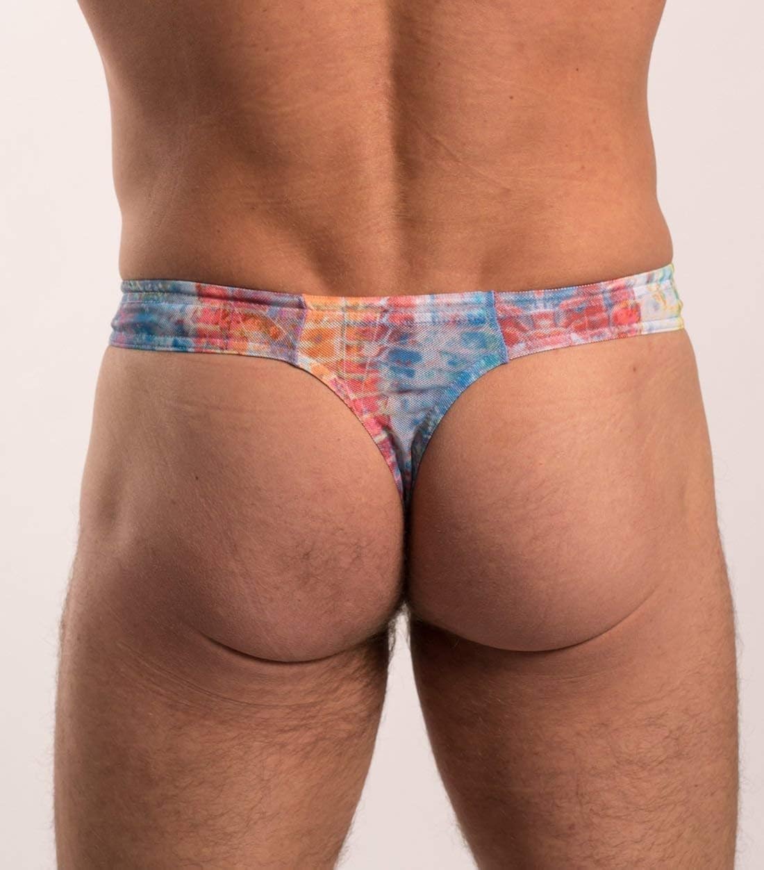 mens tan thru thong swimwear