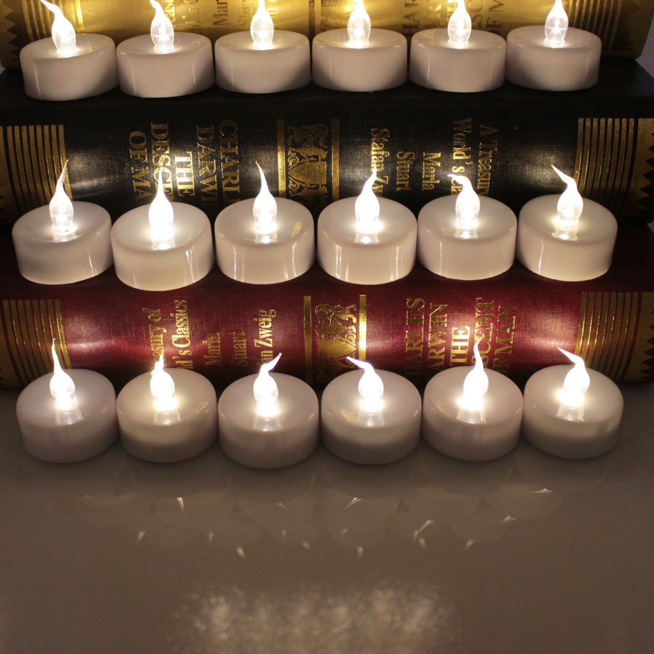 Innovator High Capacity Battery Powered Led Flameless tealight Candles ,with Remote and Timer for Outdoor, Indoor, Thankgiving Days, Christmas Day (Warm White 12pcs)