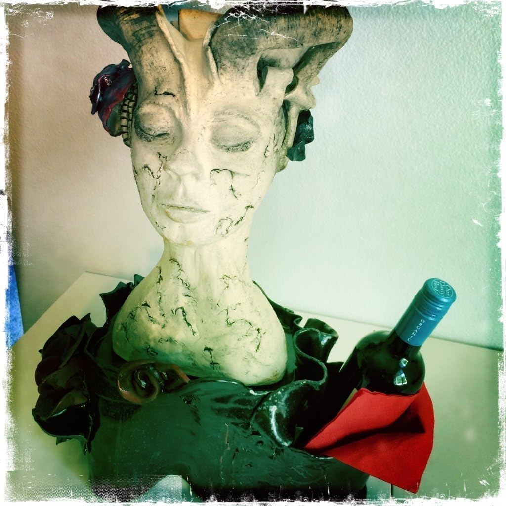 Wine bottle holder, functional ceramic sculpture by Olga Kostrova - "Intoxicating"