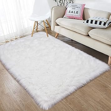 white fluffy rug for nursery