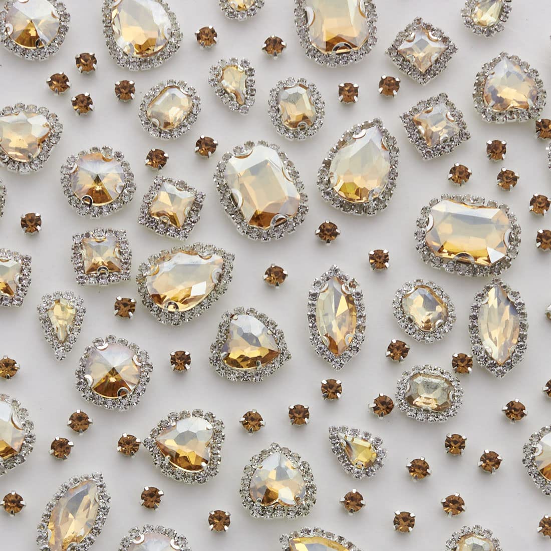 Photo 1 of TANOSII Sew on Rhinestones 100 PCS Mixed Shapes Glass Rhinestones Sew on Crystal Gems Mental Flatback with Silver Claw for Jewelry Crafts Clothes Shoes Costume Garment Champagne Type 1