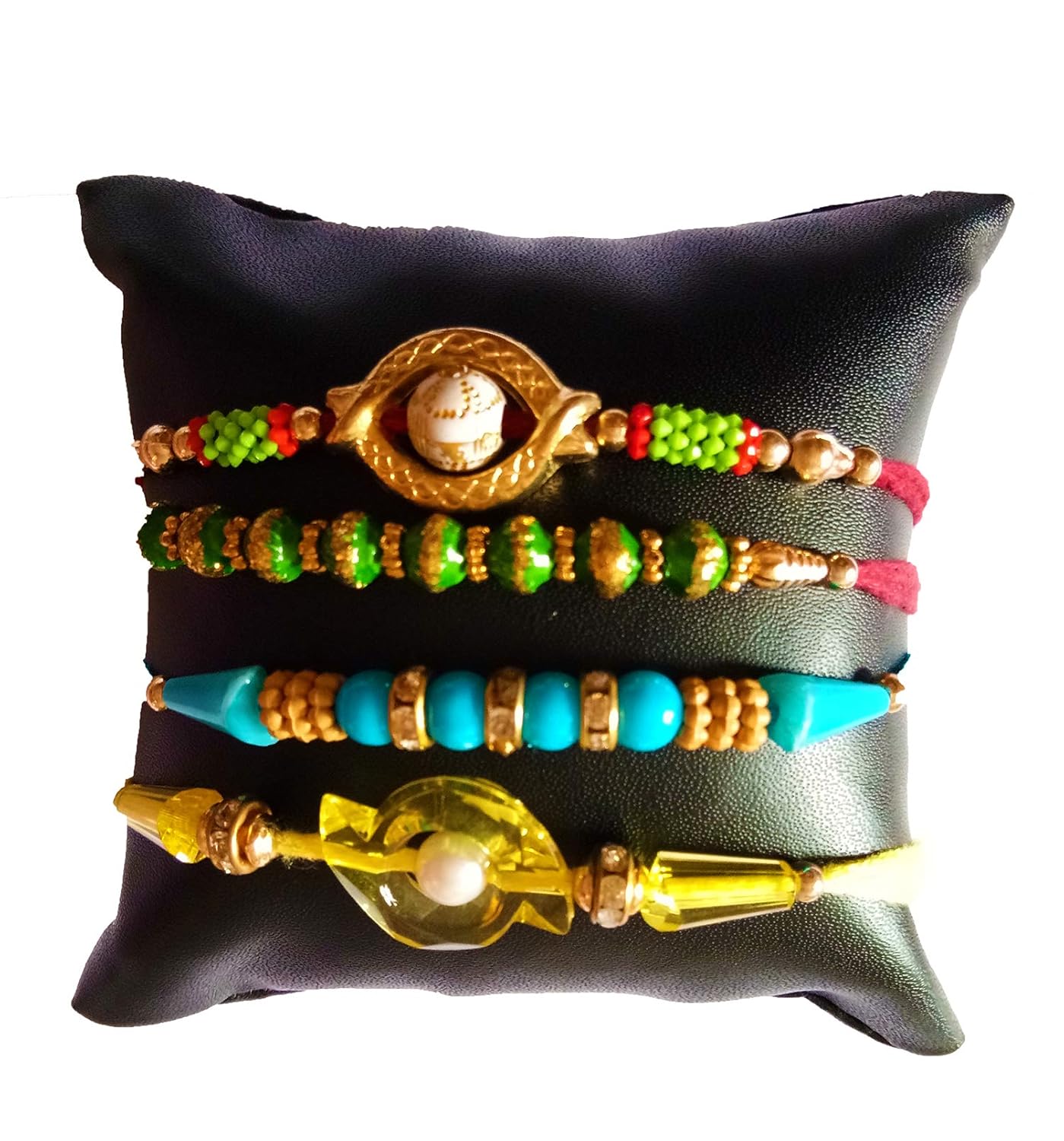 dms retail set of 4 different pattern fancy rakhi for brother with roli chawal