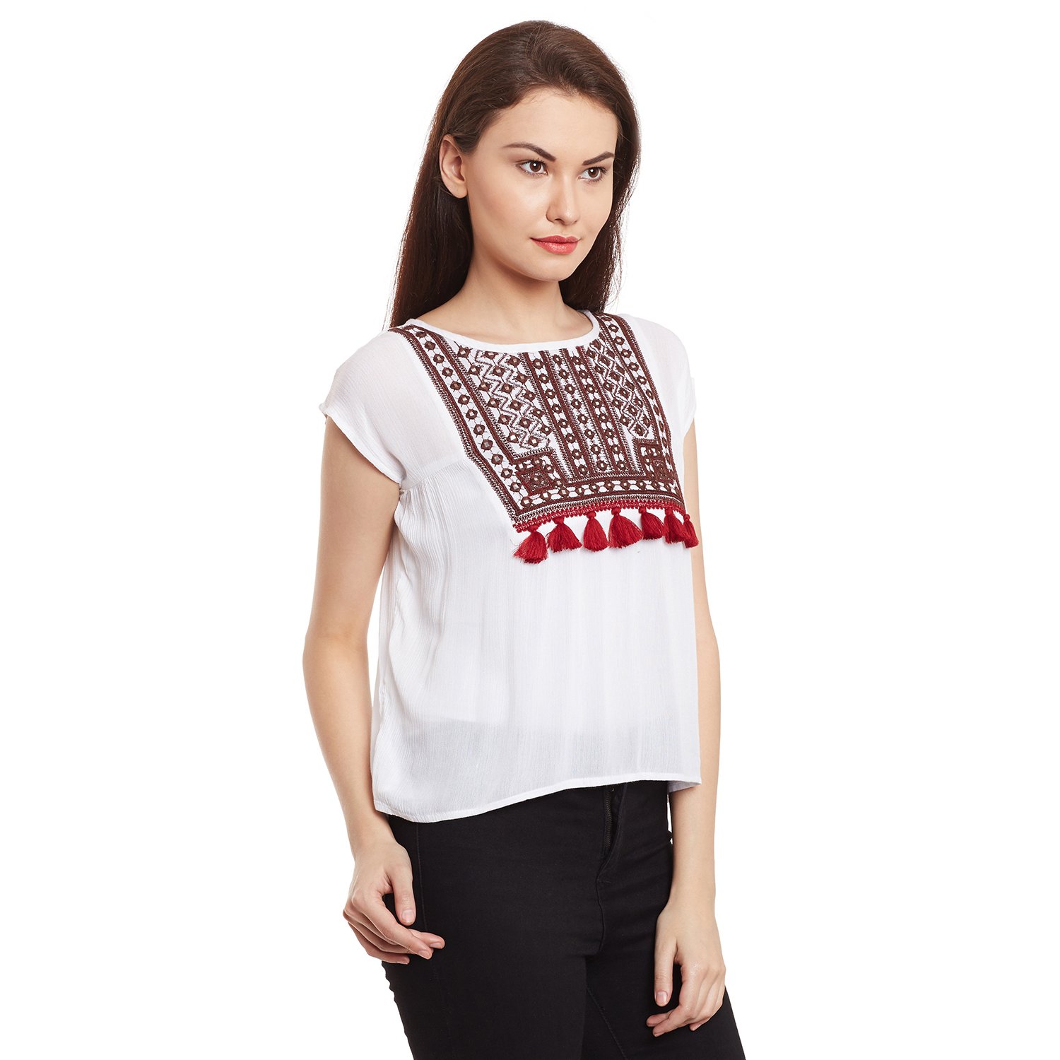 free & young white coloured top