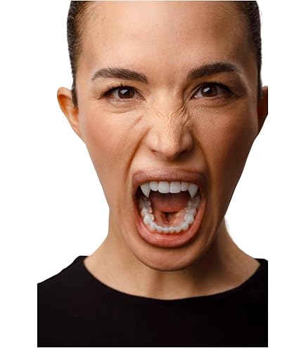 Set di denti da vampiro con sangue finto per Halloween