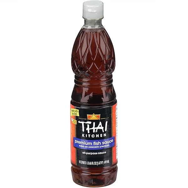 THAI KITCHEN PREMIUM FISH SAUCE, 23.66 FL OZ – ONE 23.66 FLUID OUNCE BOTTLE OF FISH SAUCE CRAFTED FOR DRESSINGS AND MARINADES FOR A SWEET, TANGY AND SPICY FLAVOR
