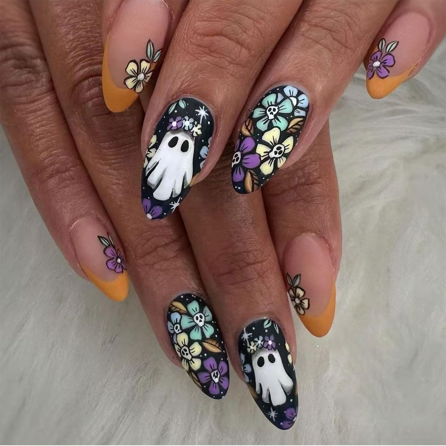 Photo 1 of Halloween Press on Nails French Tip Nails Press Ons Short Almond Fake Nails Cute Ghost False Nail with Skeleton Flower Designs Stick on Acrylic Nail Halloween Glue on Nail for Women 24Pcs