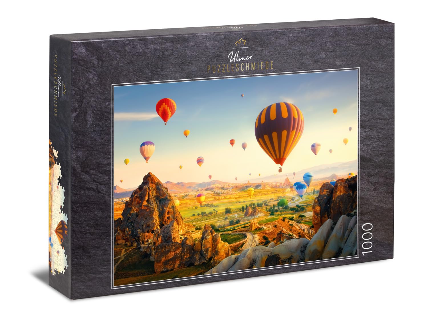Ulmer Puzzleschmiede - Puzzle "Fairy tale journey": 1000 pieces jigsaw puzzle - Picturesque image from Cappadocia in Turkey with the famous hot air balloons