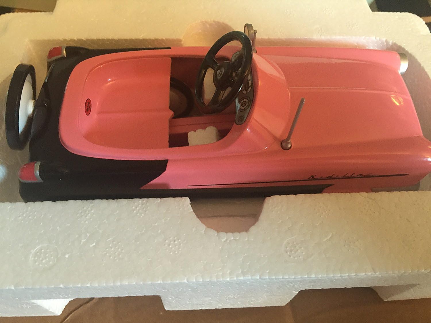 pink cadillac pedal car