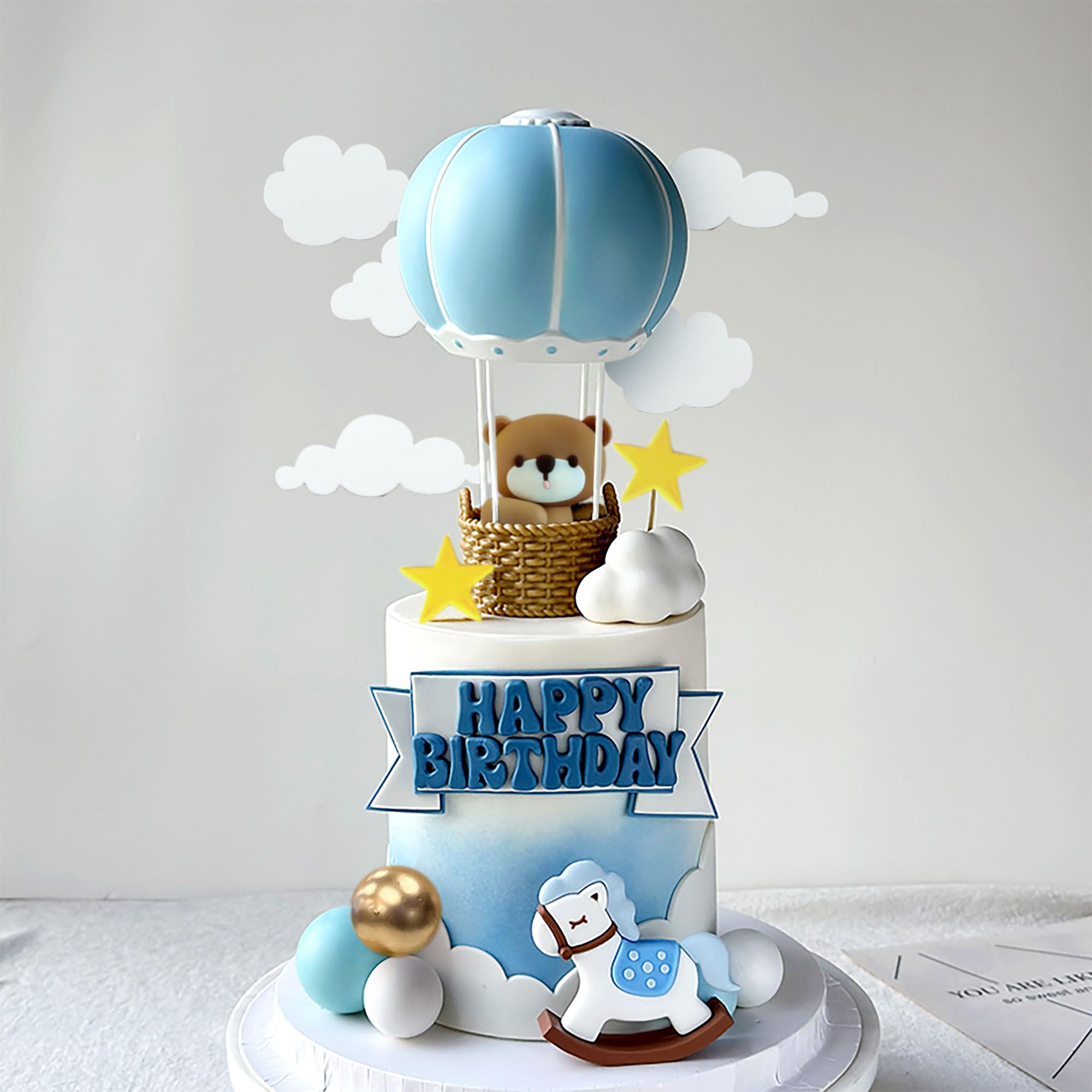 Photo 1 of JeVenis Blue Bear Cake Decoration Blue Gold Balls Cake Topper Hot Air Balloons Cake Topper Baby Shower Birthday Cake Decoration