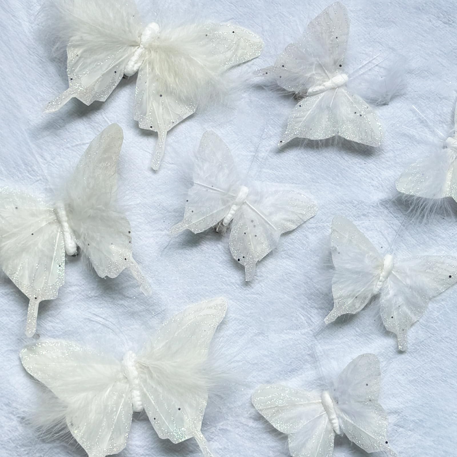 Photo 1 of 12PCS White Feather Butterfly Glitter Butterflies Decor with Clip for Christmas Tree Wreaths Garden Decorations (Sequins)